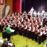 Band and choir performing together