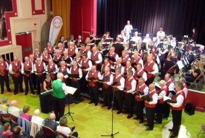Band and choir performing together