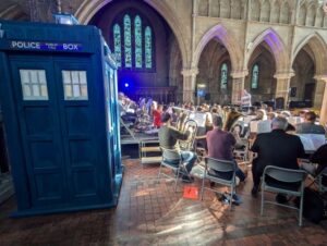 band rehearsing next to tardis in st peters parkstone church