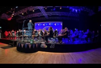 Band on stage during concert at The Barn in Ringwood