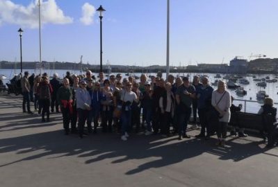 Boat trip group standing on Falmouth pier