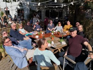 Band members sitting round table