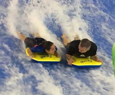 Tw band members indoor surfing
