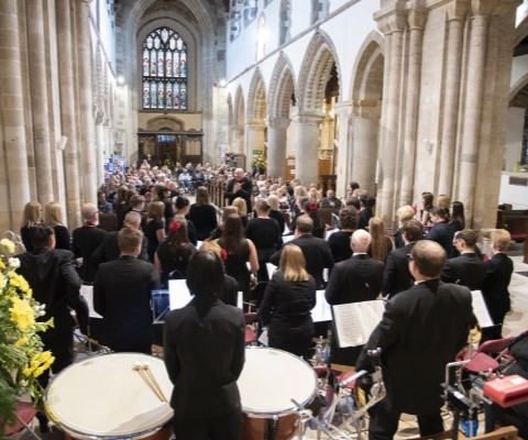 wimborne-minster-band-audience View of band and audience at concert in Wimborne Minster